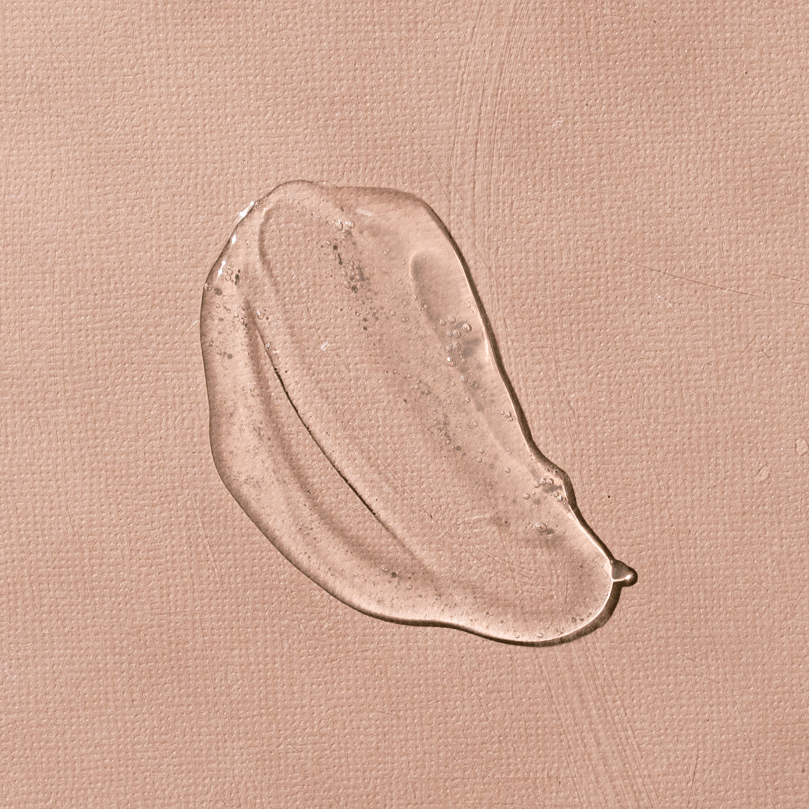 Prato Botanico Calming Cleanser picture showing texture of formulation on pink background