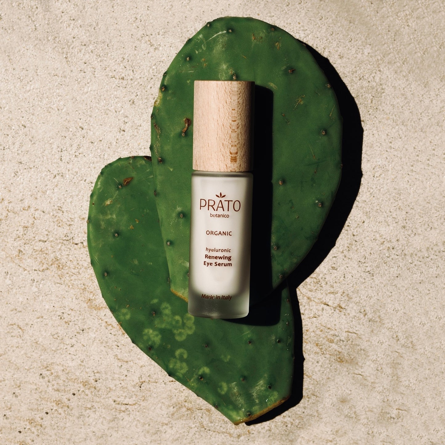 Organic hyaluronic acid Prato Botanico Renewing Eye Serum on two prickly pear stems