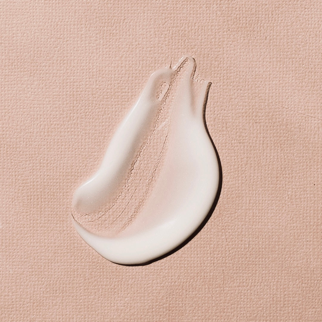 Prato Botanico Renewing Eye Serum texture picture on a pink background