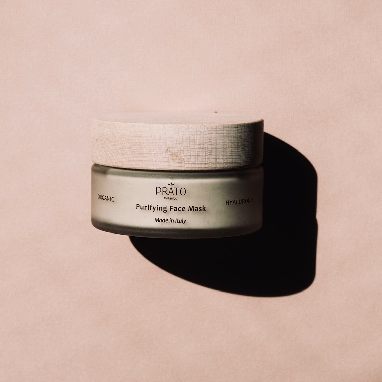 Prato Botanico Purifying Hyaluronic Acid Clay Facial Mask on Pink Background